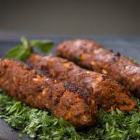 Lamb Seekh Kabab · Minced lamb marinated in freshly ground spices and black pepper.