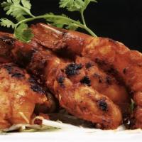Tandoori Shrimp · Shrimp marinated in a exotic blend of Indian spices, then cooked on a skewer in the tandoor.