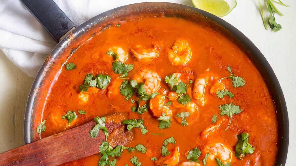 Shrimp Curry · Shrimp cooked in a blend of Indian spices.