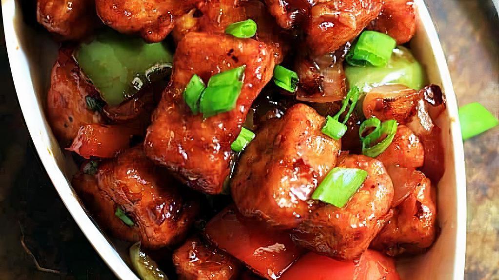 Chilli Paneer · Paneer chopped and seasoned with corn starch sautéed with soy sauce, onion and bell peppers.