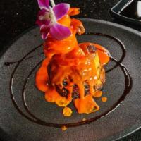 Tokyo Tower · Fried sweet plantain topped with spicy shrimp and mambo sauce