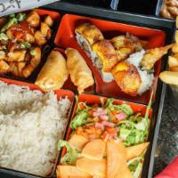Traditional Bento Box · White rice, green salad, dumplings, California roll, miso soup teriyaki chicken, beef, or sh...