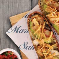 Mexican Molletes · Open-faced sandwich made on a freshly baked baguette, topped with shredded chicken, refried ...