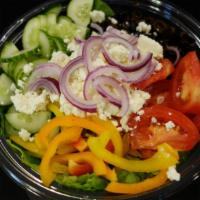 Greek Salad · Romaine lettuce, crumbled feta cheese, red onion, black olives, peppers, tomato, cucumber, a...