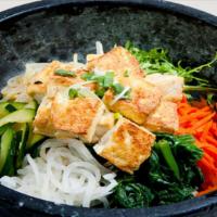 Vegetarian Tofu Bibimbab · Fried tofu with vegetables and rice.