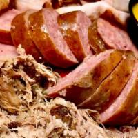 Variety Platter For One · A pound of up to 3 meats with two side options.