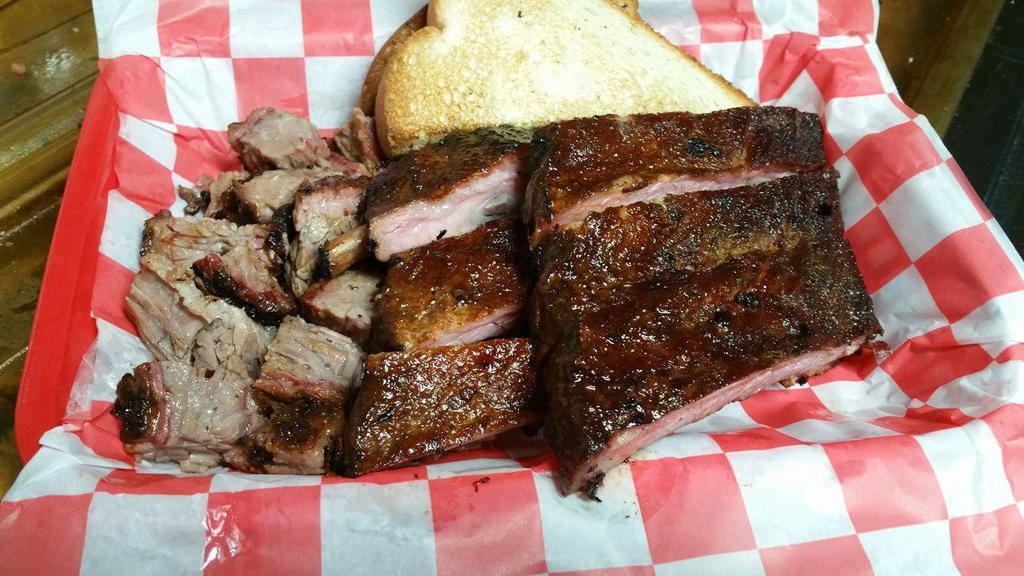 Rib & Burnt End Platter · Hayward's St. Louis ribs paired with our famous hickory smoked burnt ends.