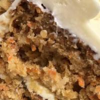 Carrot Cake · The classic carrot cake you love, studded with carrots, raisins, walnuts, and topped with ve...