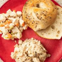 Chicken Salad · Served with lettuce, tomato and onions on a bagel, roll, white, wheat or rye bread, with a p...