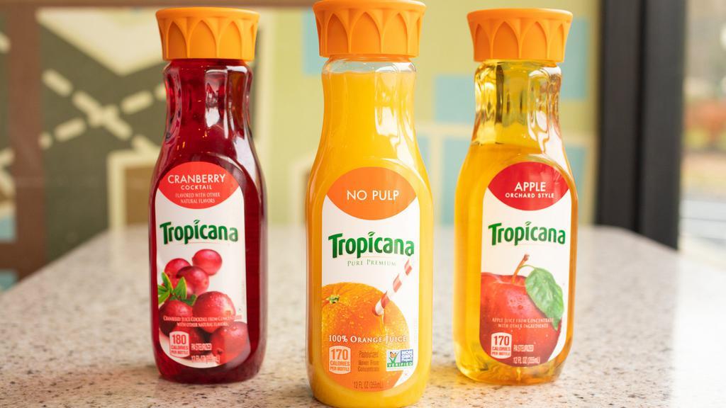 Tropicana Juice, 16 Oz · Choose from the following choices: original orange juice, apple, grape fruit, grape, cranberry
