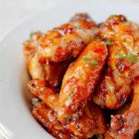 Sweet Chili Wings · 6 bone-in sweet chili chicken wings. Served with celery, carrots, and blue cheese or ranch d...