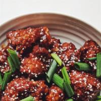 Spicy Korean Glazed Wings · 6 bone-in spicy Korean glazed chicken wings. Served with celery, carrots, and blue cheese or...