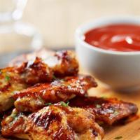 Honey Bbq Wings · 6 bone-in honey BBQ chicken wings. Served with celery, carrots, and blue cheese or ranch dre...