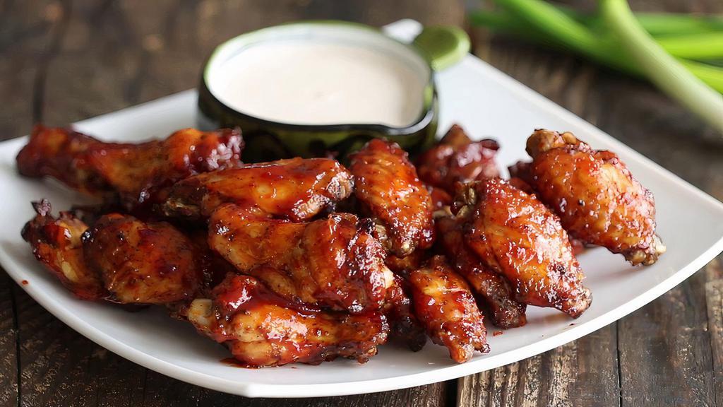 Bbq Wings · 6 bone-in BBQ chicken wings. Served with celery, carrots, and blue cheese or ranch dressing.