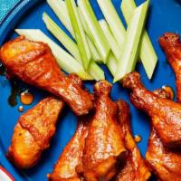 Buffalo Mild Chicken Wings · 6 bone-in buffalo mild chicken wings. Served with celery, carrots and blue cheese or ranch d...