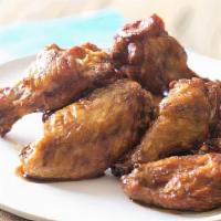 Plain Wings · 6 bone-in plain chicken wings. Served with celery or carrots, and blue cheese or ranch. Serv...