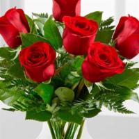 The Ftd Simply Enchanting Rose Bouquet · The FTD simply enchanting rose bouquet brings together lush red roses to make a lasting impr...