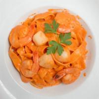 Fettuccine Shrimp & Scallops · Jumbo shrimp and scallops in a creamy rose sauce.