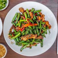 Pad Prink Khing · (Hot,Spicy). Green beans, lime leaves, bell peppers, and curry paste. stir fry entrees are c...