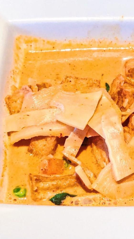 Red Curry · (Hot, Spicy, Gluten Free, Dairy Free). Bamboo shoots, bell peppers, peas, carrots, basil leaves in red curry sauce. Curry  entree is cooked to order with your choice of protein and served with Jasmine rice.