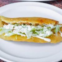 Quesadilla · Folded, pan-fried Corn Tortilla of handmade dough with your choice of Filling, Lettuce, Coti...