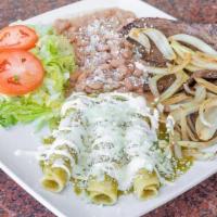 Enchiladas · Enchiladas (3) Rolled Corn Tortillas doused in the Sauce of your choice and garnished with O...