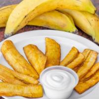 Fried Plantains · A classic Carribean treat, pan-fried cut up Plantains Sour Cream or Condensed Milk