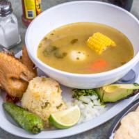 Sopa De Gallina/Chicken Soup · acompanada con arroz, cilantro, cebolla, chile toreado, aguacate, limon y tres tortillas .Ac...