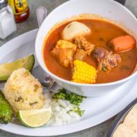 Sopa De Mondongo/ Tripe Soup · acompanada con arroz, cilantro, cebolla, chile toreado, aguacate, limon y tres tortillas .Ac...