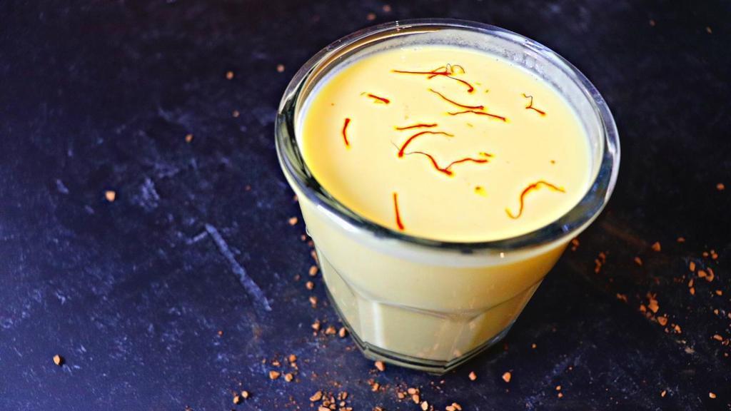 Mango Lassi · Smoothie blend of whipped yogurt and pureed mango.