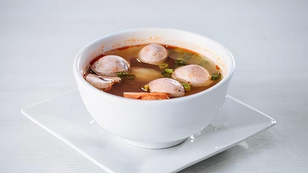 Cup Spicy Tom Yum Soup · Spicy. Thai roasted chili paste, tomato, fresh lime, mushroom, scallion.