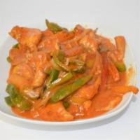 Thai Red Curry Chicken · Spicy with  multi colored peppers, bamboo shoots and coconut milk