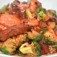 Cr17. Triple Delight · Chicken, Shrimp and beef with broccoli, snow peas and mushroom