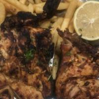 Whole Grilled Chicken · Lightly marinated but tasty grilled chicken, served with your choice of rice or fries, fresh...