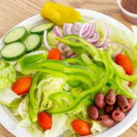 Garden Salad · Fresh onions, tomatoes, kalamata olives, green peppers, and cucumber over lettuce with side ...