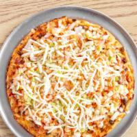Taco Pizza · Beef or chicken with chilled diced lettuce, tomato, and onion.