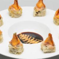 Volcano Roll · Hot. Shrimp and crab stick tempura; topped with scallop and Alaskan king crab mixed with spi...