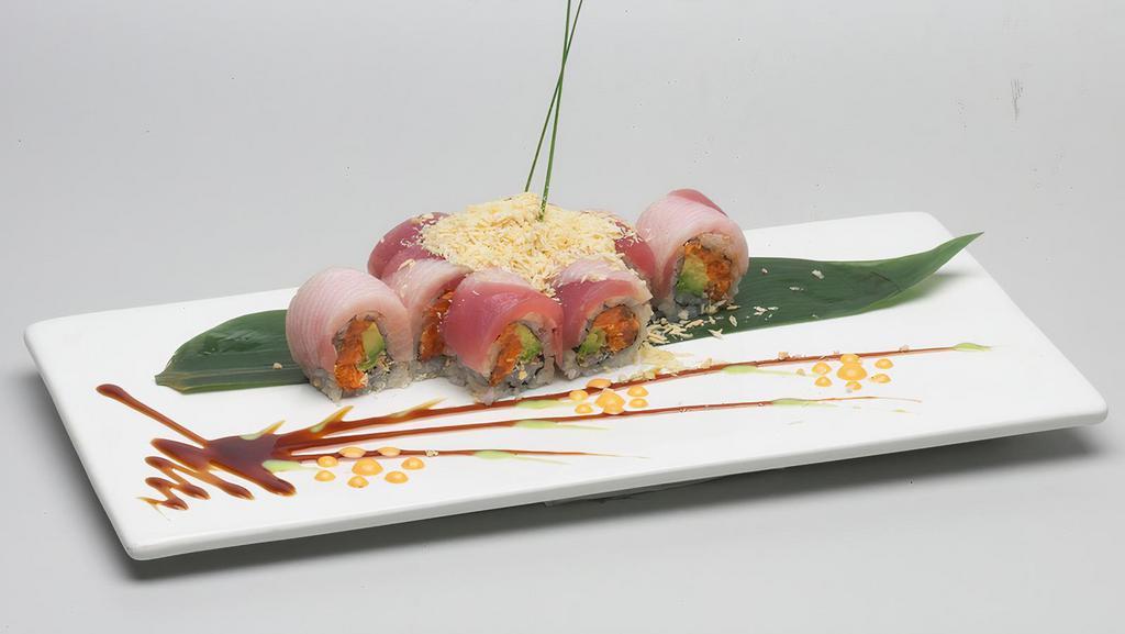 French Crunchy Roll · Hot. Spicy salmon and avocado inside; topped with yellowtail, tuna and panko flakes. Served with eel sauce, spicy mayo, and honey wasabi.