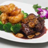 Steak & Shrimp · Hot. Grilled marinated steak tip and jumbo shrimp in general tao's sauce.