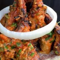 Lamb Chops · Rack of lamb marinated in yogurt and chef's special spice blend, perfection in tandoor and s...