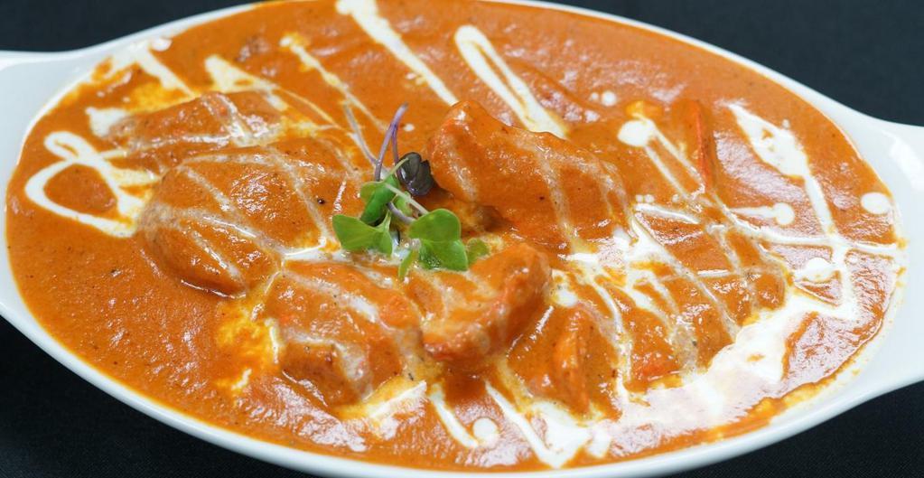 Murg Tikka Masala · Chicken breast grilled in tandoor and cooked in creamy onion, bell pepper tomato sauce