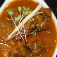 Chicken Korma · pieces of chicken thigh cooked in a rich aromatic onion sauce and cashew paste