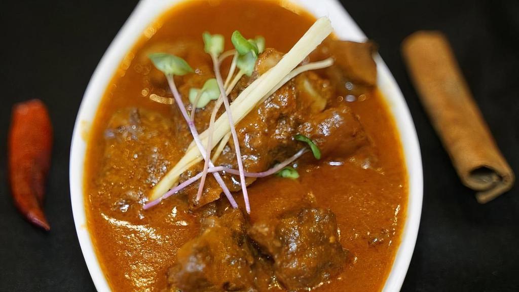 Chicken Korma · pieces of chicken thigh cooked in a rich aromatic onion sauce and cashew paste