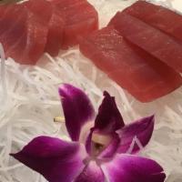 Tataki Tuna Sashimi · Pepper seared thin slice ahi tuna with goat cheese, fried leek and soy mustard ponzu sauce. ...