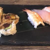 Sushi & Sashimi Combo · Chef's choice 6 pieces sushi and 8 pieces sashimi with shrimp tempura roll. Raw fish.
