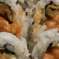 Spicy Salmon Roll · Spicy salmon, cucumber with spicy sauce. Raw fish.