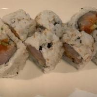 Spicy Yellowtail Roll · Spicy yellowtail, green onion, cucumber and masago inside. Raw fish.