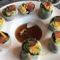 Crystal Roll · Salmon, tuna, mango, avocado, cucumber, lettuce wrapped in rice paper with sweet spicy ponzu...