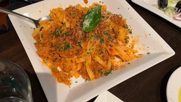 Fettuccine Bolognese · Our homemade tomato meat sauce with a touch of heavy cream.