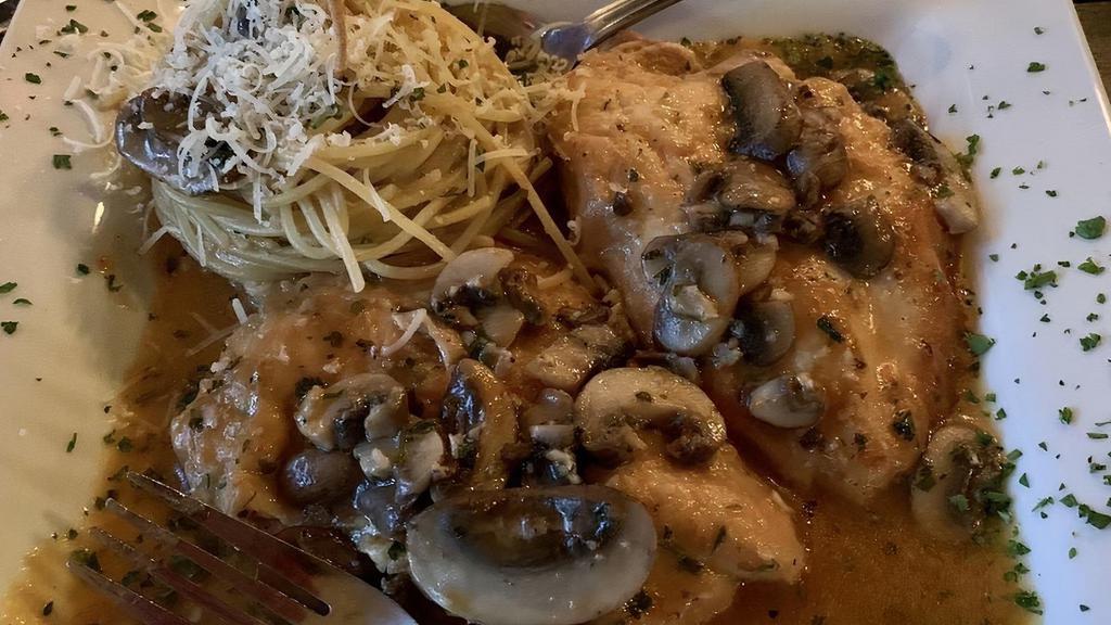 Chicken Marsala · Sautéed with imported marsala wine and topped with mushrooms. Served with spaghetti pasta.